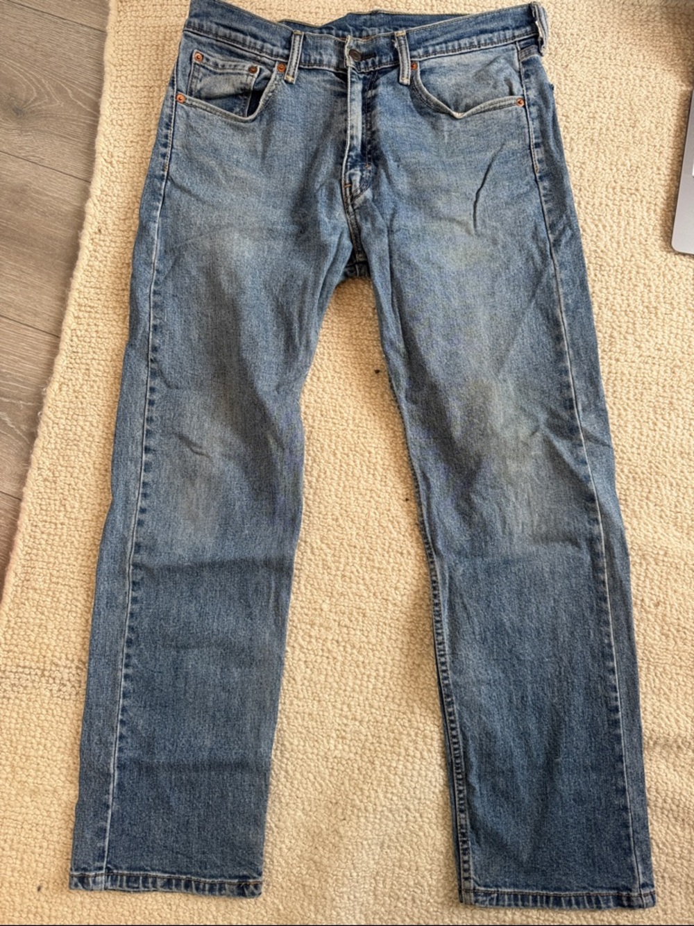Levi's faded blue straight-leg jeans